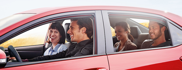 People in a Chevy Car