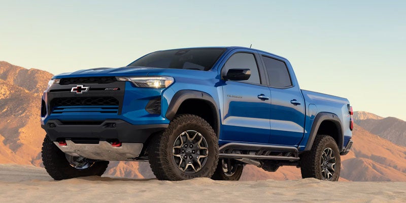Side view of A blue 2026 Chevrolet Colorado
